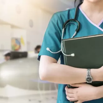 A staff man is showing a geriatric nurse from all over the world